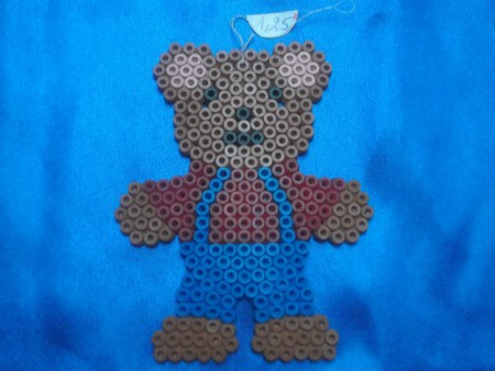 Ourson habillé - Prix : 1,25 euro - 9,7 cm de large sur 12 cm de haut